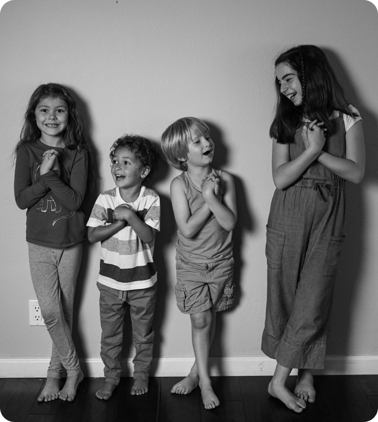 Children standing laughing