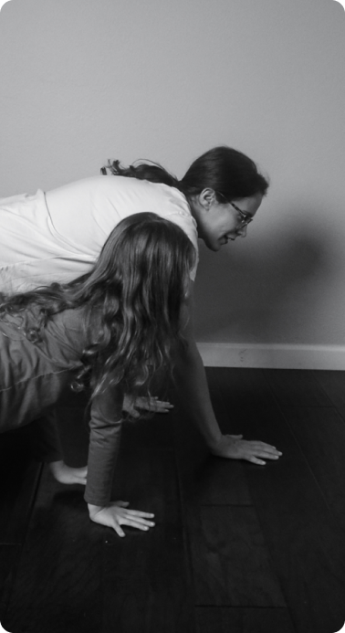 woman and girl crawling